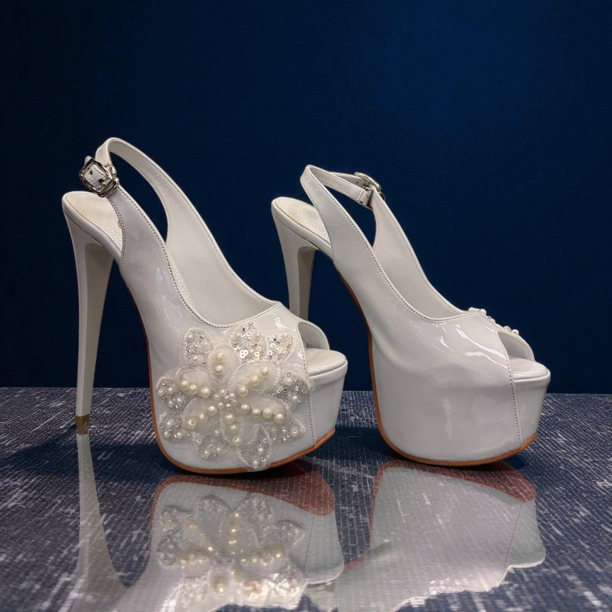 NIKPA ALEX white patent leather slingback platform heel with pearl and sequin floral embellishment