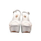 NIKPA ALEX white patent leather slingback platform heel with pearl and sequin floral embellishment