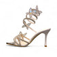 NIKPA ASHLEY white and silver stiletto sandal with rhinestone butterfly accents and spiral ankle strap
