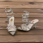 NIKPA ASHLEY white and silver stiletto sandal with rhinestone butterfly accents and spiral ankle strap