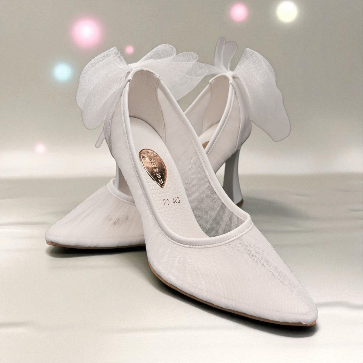 NIKPA PAPILLON white bridal high heels featuring a sheer mesh finish and elegant tulle bow detail