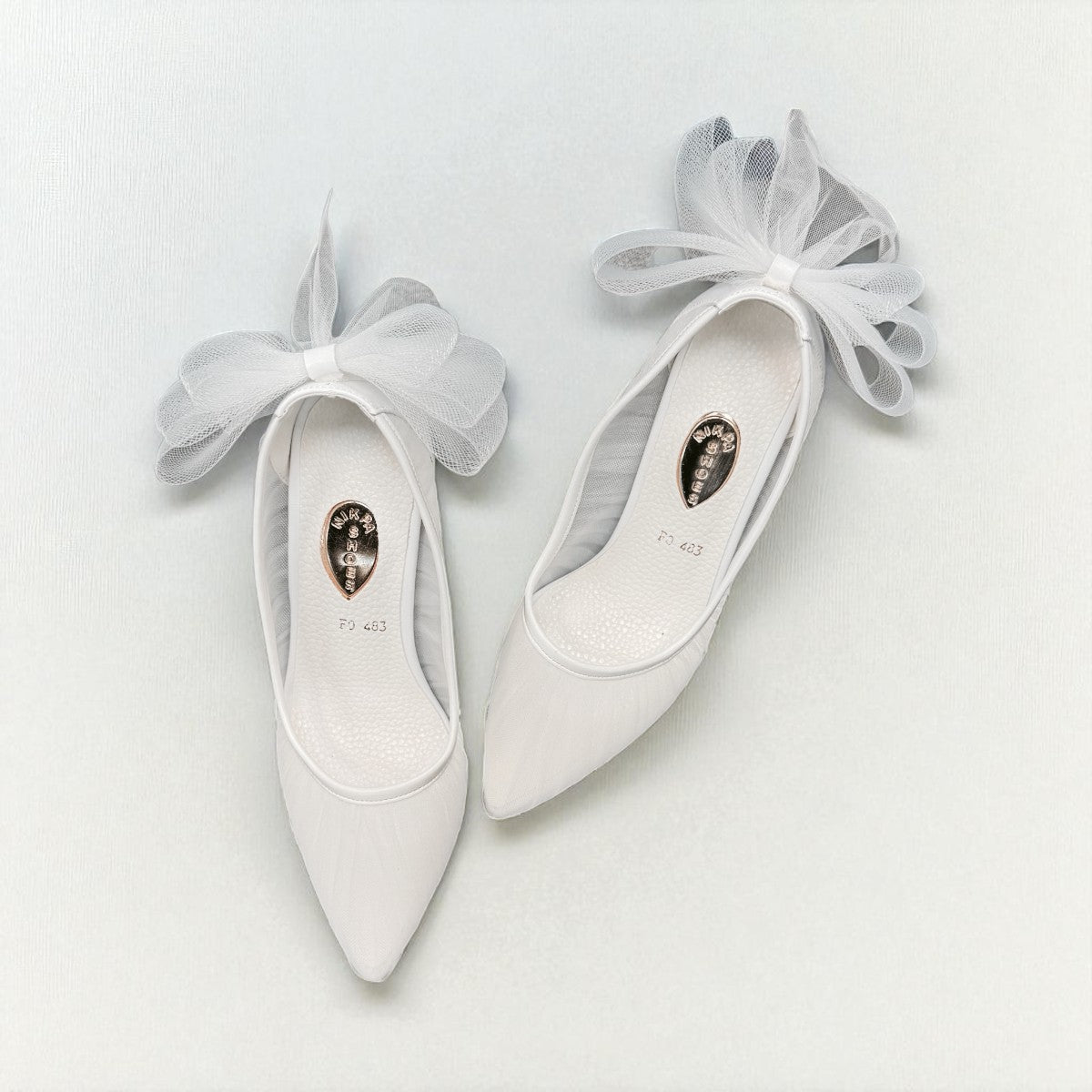 NIKPA PAPILLON white bridal high heels featuring a sheer mesh finish and elegant tulle bow detail