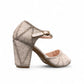 Nikpa lalala white synthetic bridal heels with intricate rhinestone detailing and an ankle strap in a ballroom
