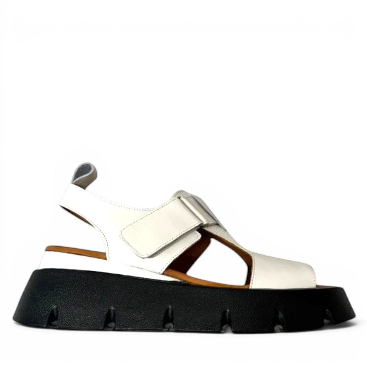 roamers white leather platform sandals with adjustable straps and a chunky black treaded sole.
photo of the right side