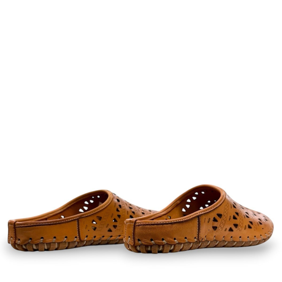 tan leather backless slip-on sandal with breathable perforated cutouts and a durable rubber outsole.
photo of the back side