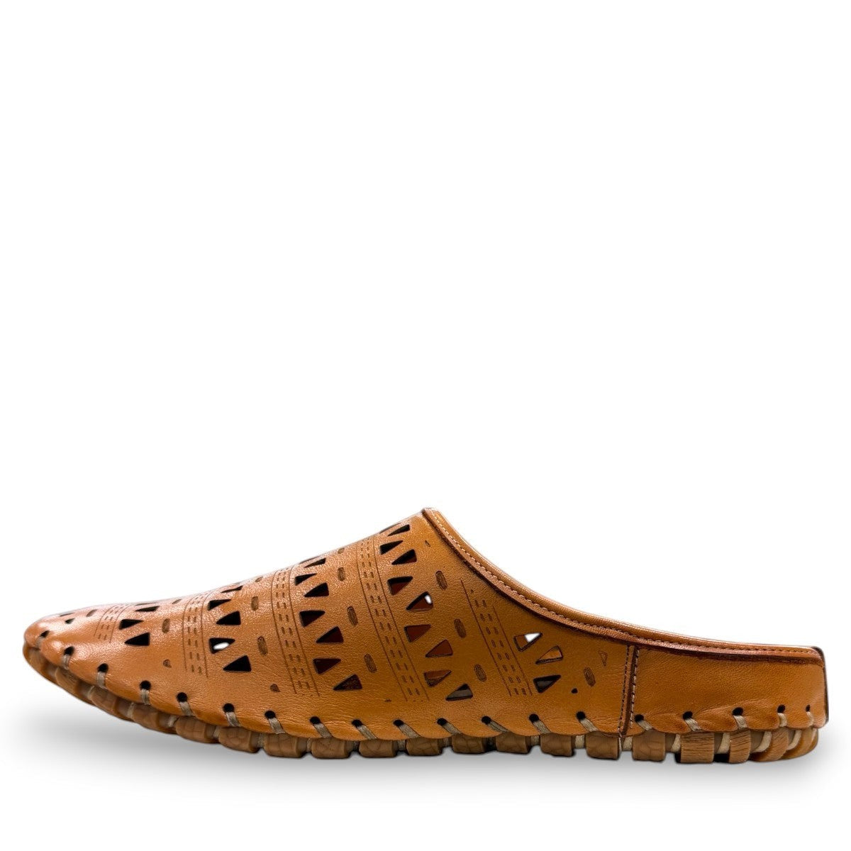 tan leather backless slip-on sandal with breathable perforated cutouts and a durable rubber outsole.
photo of the left side