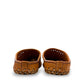 tan leather backless slip-on sandal with breathable perforated cutouts and a durable rubber outsole.
photo of the back side