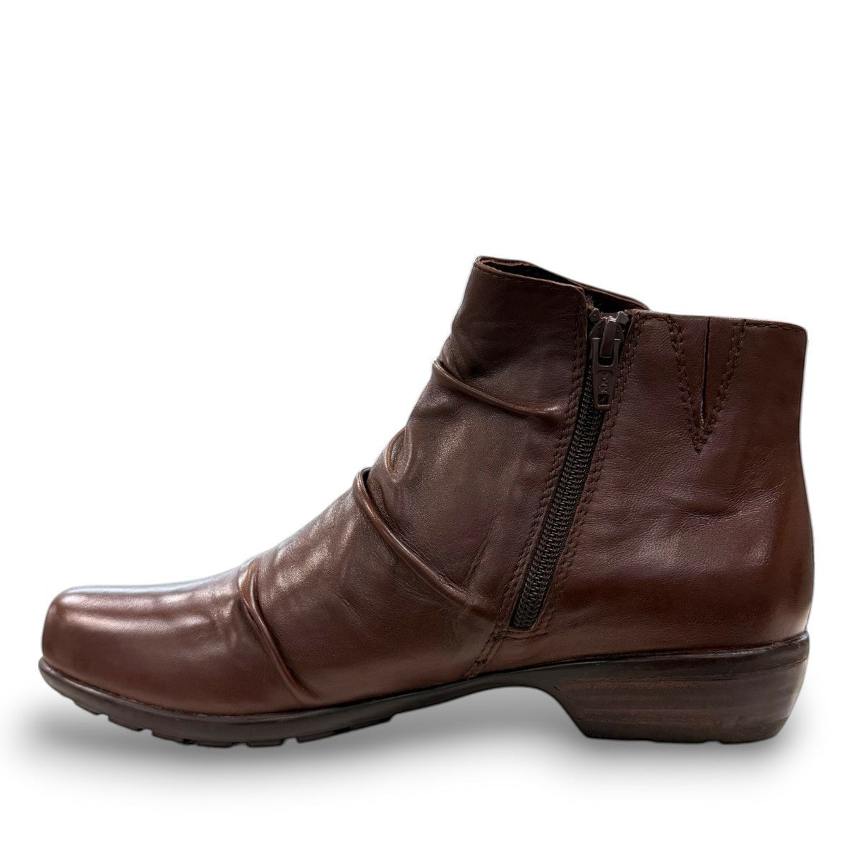 Ros Hommerson Esme brown leather ankle bootie with ruched vamp detailing and a low stacked heel.
photo of the left side