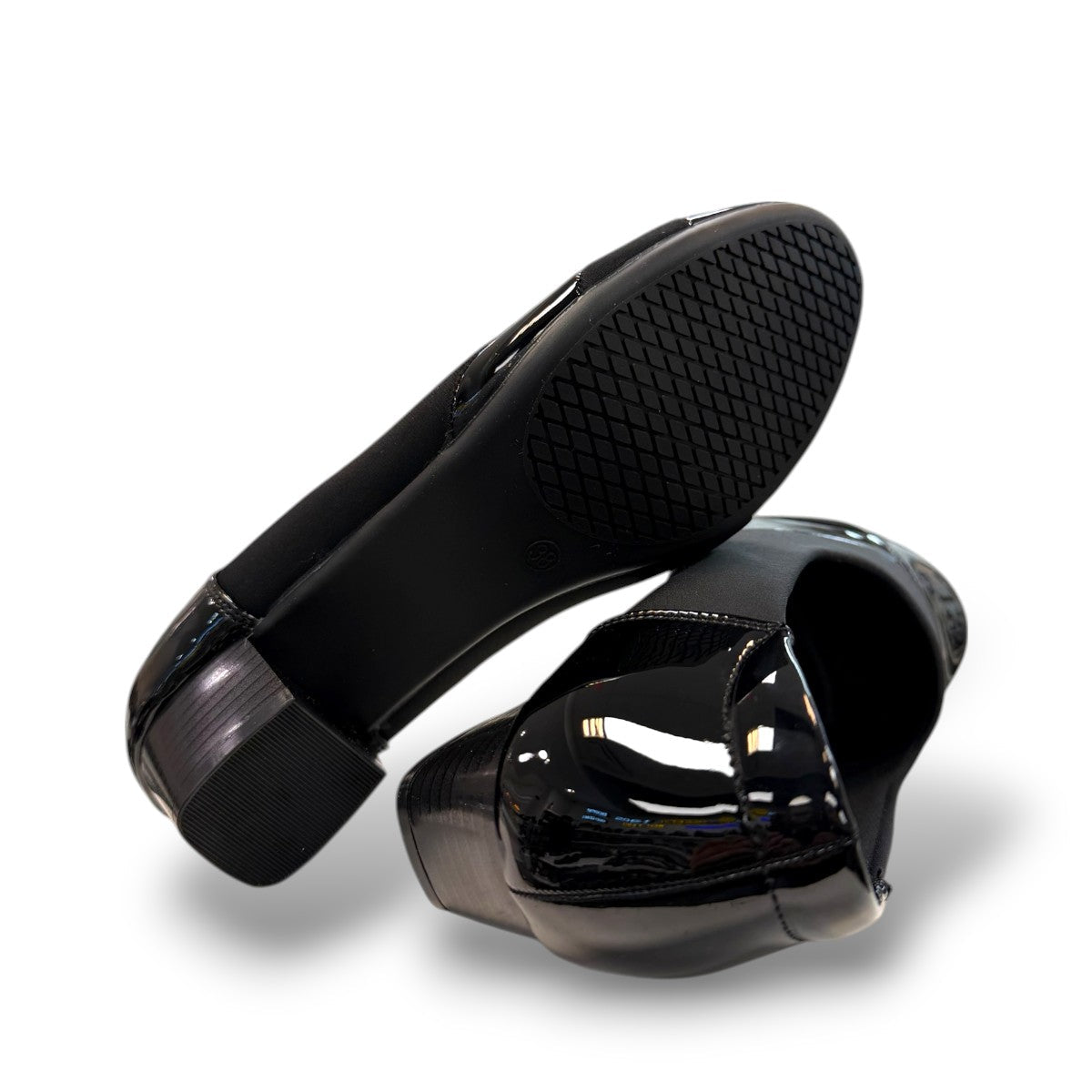 SOLE FLEX F8106 black patent leather block heel pump with a comfortable, refined semi-formal design.
photo of the bottom side