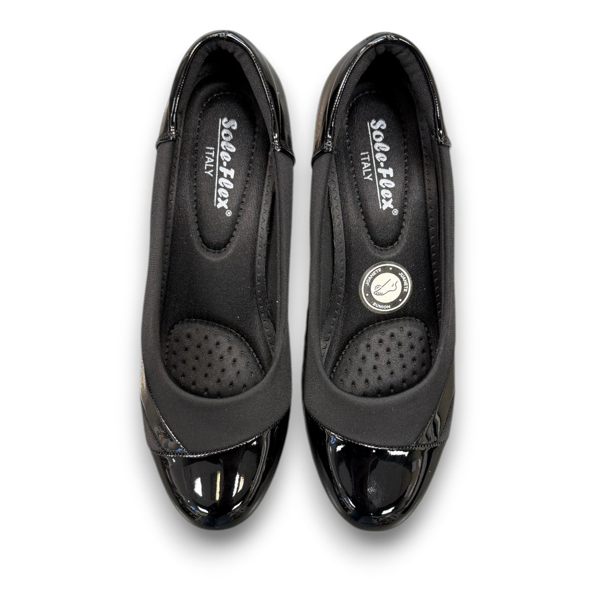 SOLE FLEX F8106 black patent leather block heel pump with a comfortable, refined semi-formal design.
photo of the top side