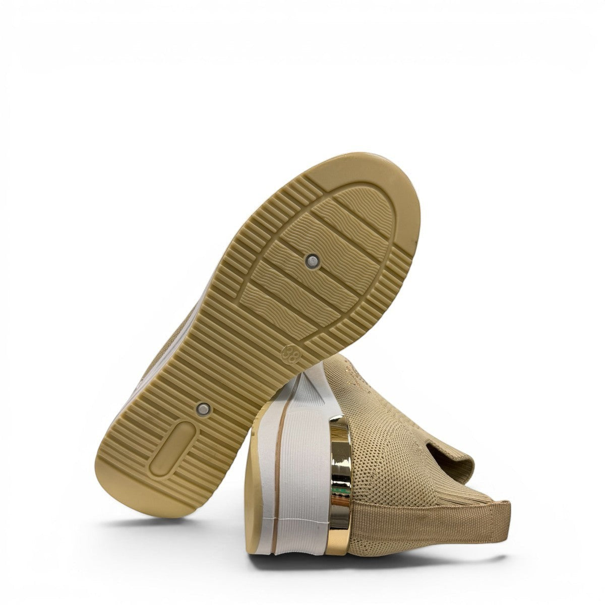 STEFANIA S4000 beige stretch-knit platform sneakers with slip-on design, cushioned sole, and subtle shimmer details.
photo of the bottom side