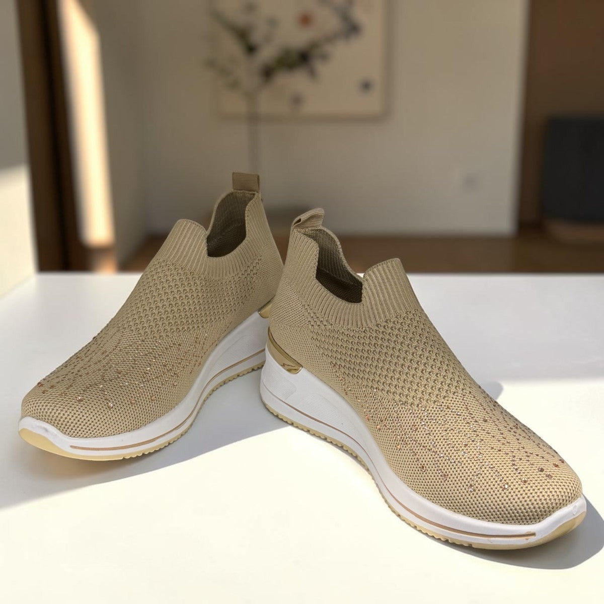 STEFANIA S4000 beige stretch-knit platform sneakers with slip-on design, cushioned sole, and subtle shimmer details.
photo of the front side