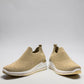 STEFANIA S4000 beige stretch-knit platform sneakers with slip-on design, cushioned sole, and subtle shimmer details.
photo of the front side
