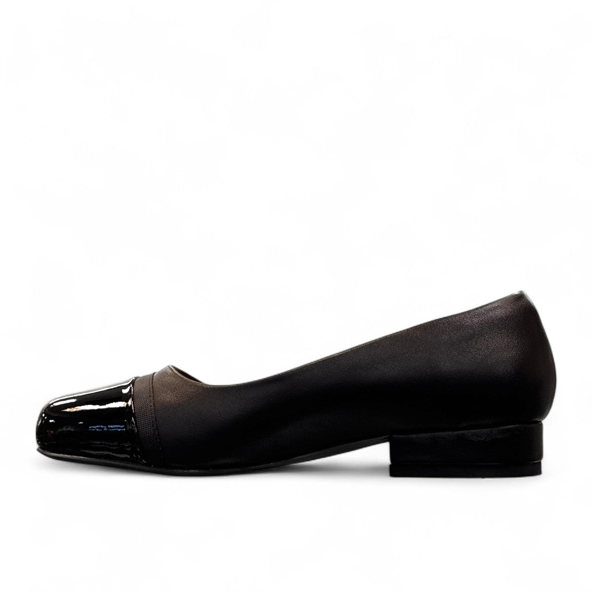Sabatini of Florence SF1 black slip-on shoe with a glossy cap-toe and low block heel.
photo of the left side