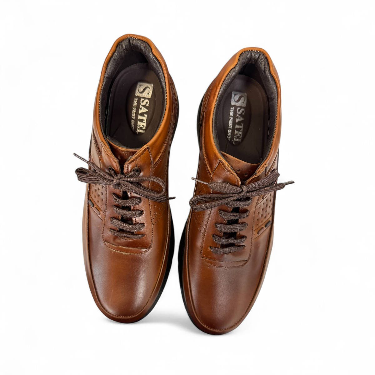 Satel Abgineh brown leather lace-up shoe with perforated detail and a durable black rubber outsole. Photo of upper view.
