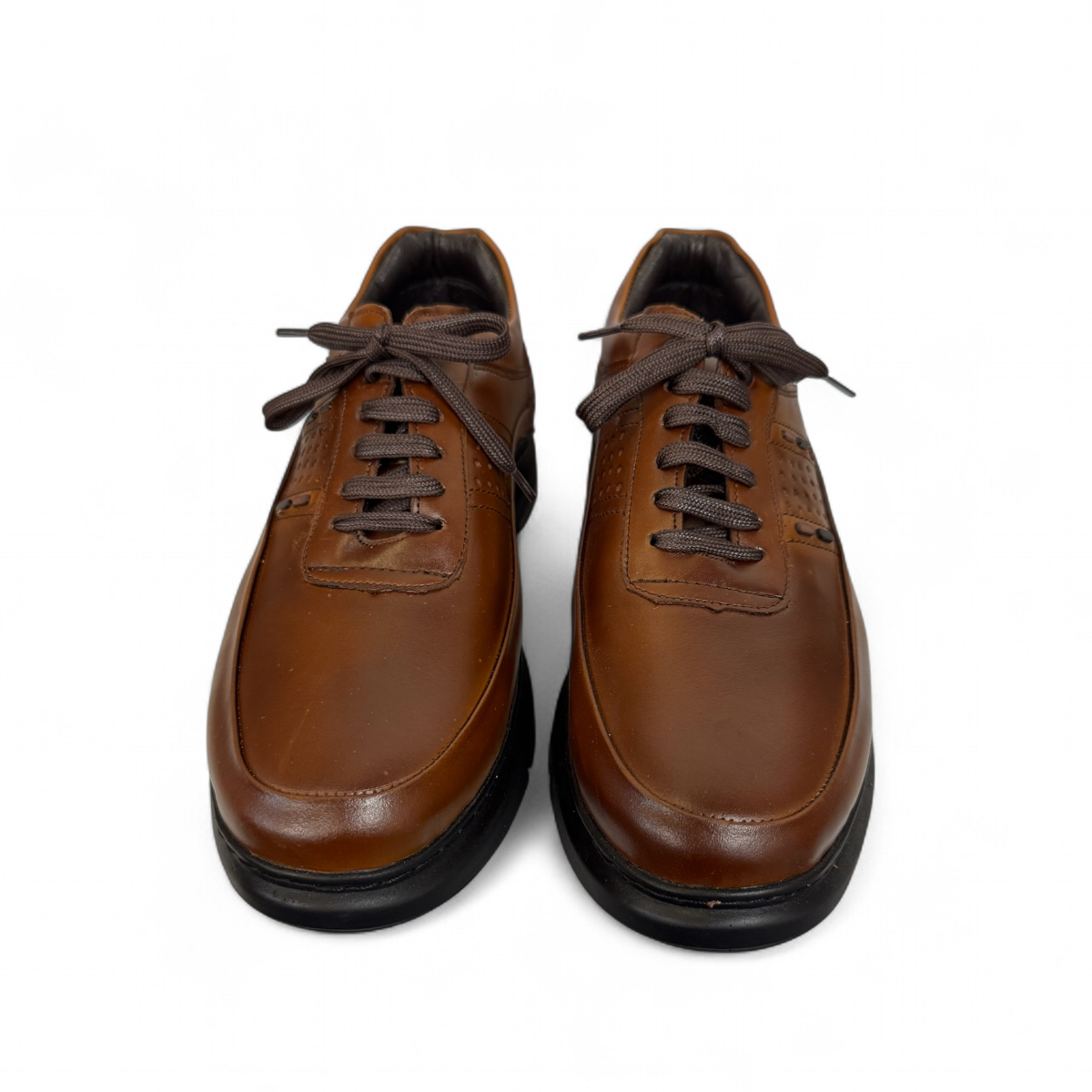 Satel Abgineh brown leather lace-up shoe with perforated detail and a durable black rubber outsole. Photo of front view.