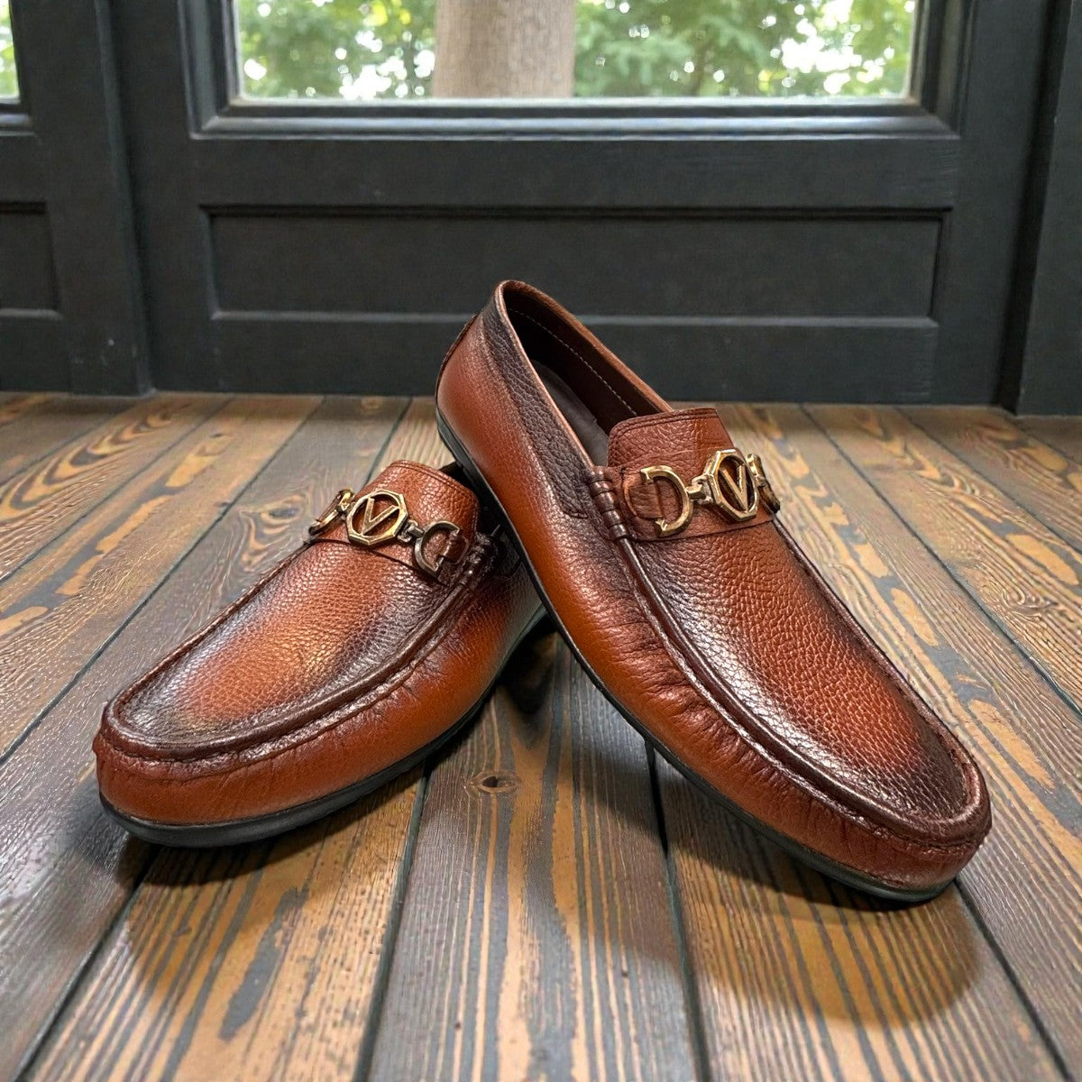 Satel Ariashahr light brown leather loafers with handmade stitching and a metallic bit detail. Photo of upper view.