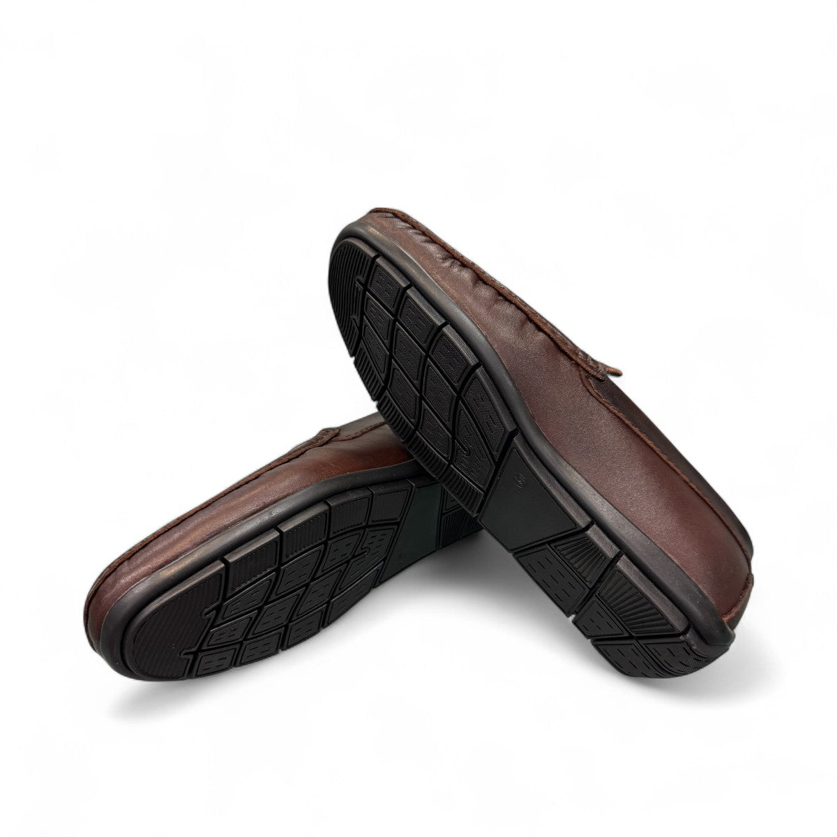 Satel Gishan dark brown leather loafers with handmade stitching and tassel detail for formal wear. Photo of bottom view.