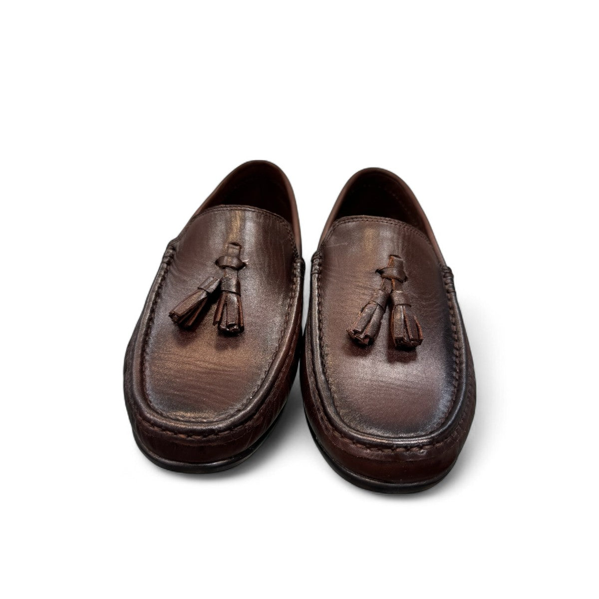 Satel Gishan dark brown leather loafers with handmade stitching and tassel detail for formal wear. Photo of front view.