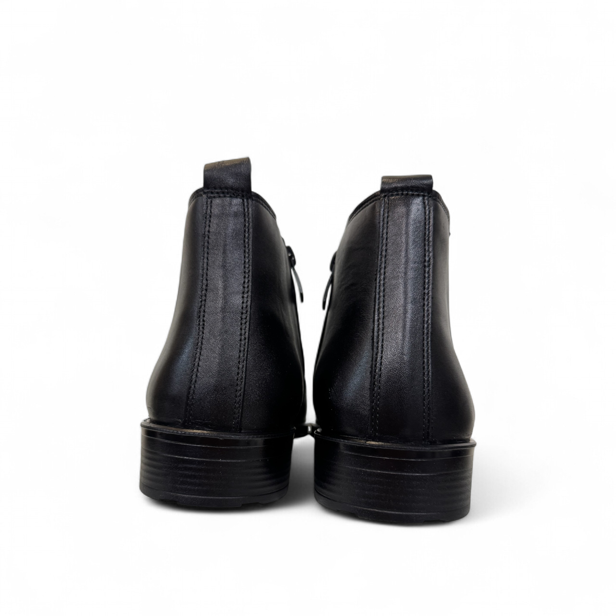 Satel Mashhad black leather boots with brogue detailing and elastic side panels on a white background. Photo of back view.