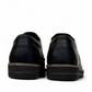 Satel Niavaran black leather slip-on shoes with handmade stitching and durable rubber outsole. Photo of back view.