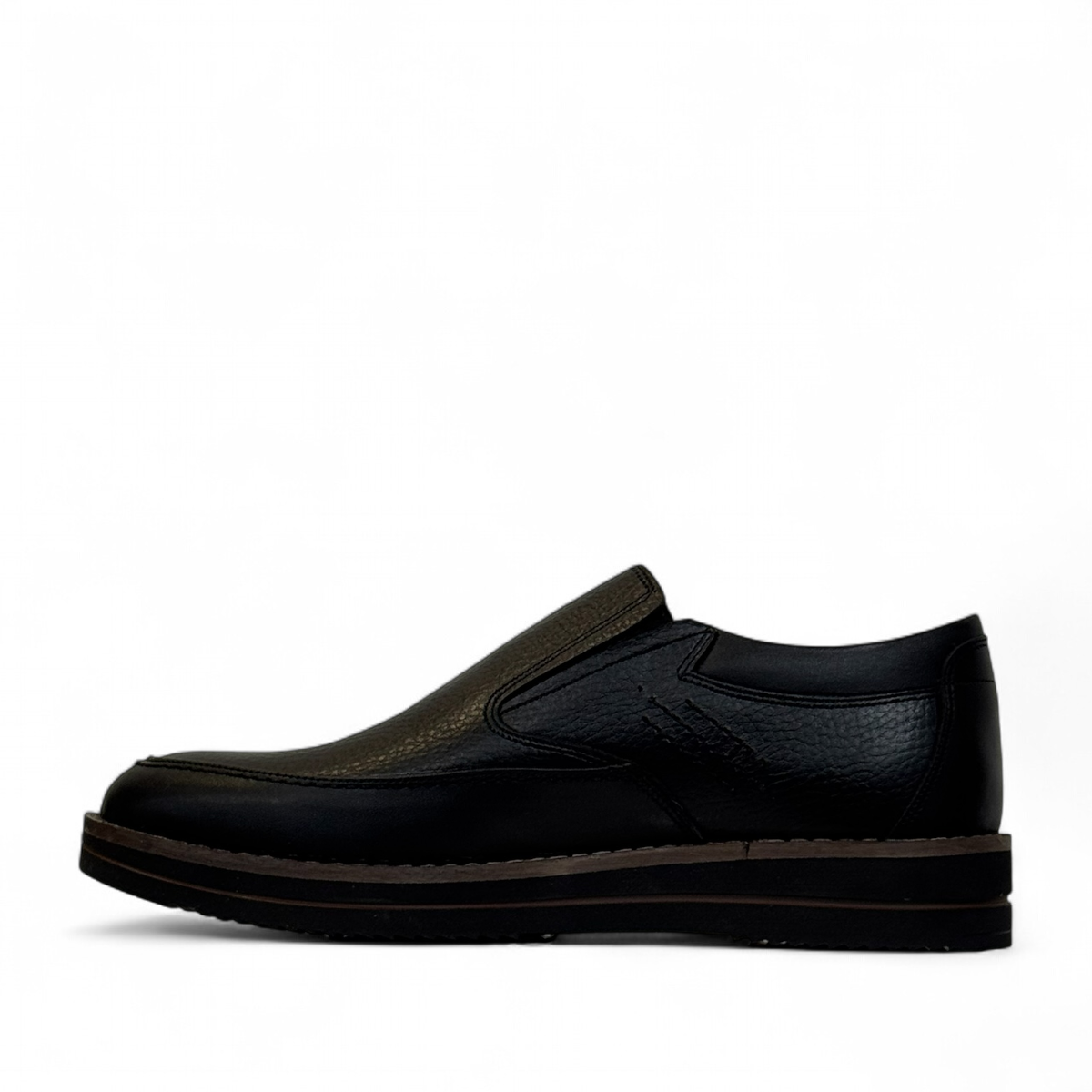 Satel Niavaran black leather slip-on shoes with handmade stitching and durable rubber outsole. Photo of left side view.