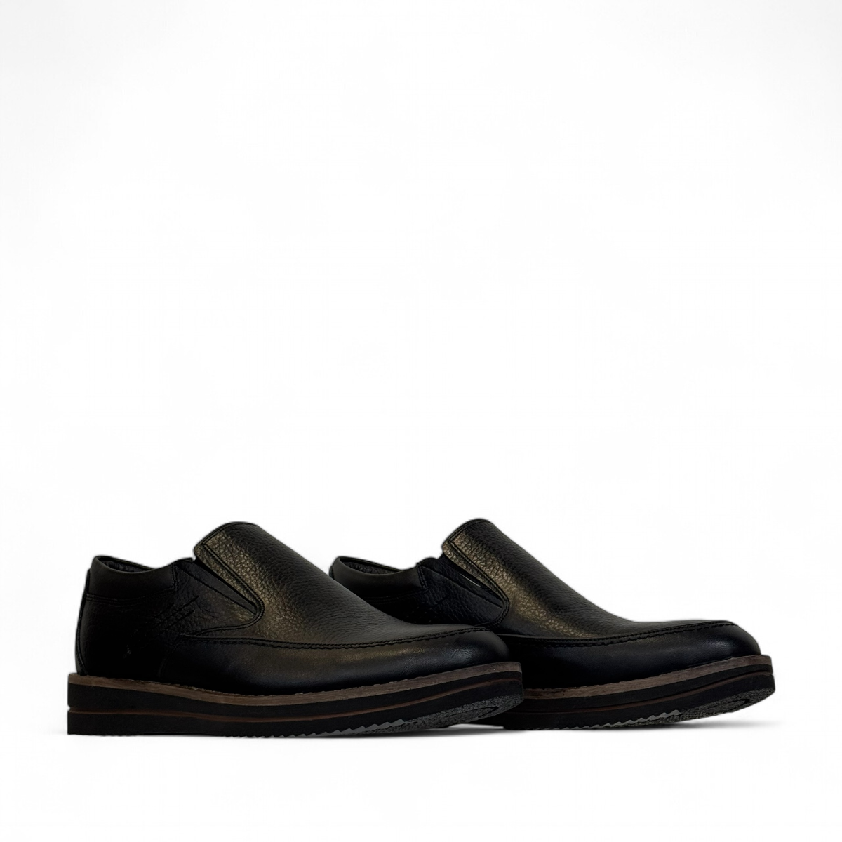 Satel Niavaran black leather slip-on shoes with handmade stitching and durable rubber outsole. Photo of side views.