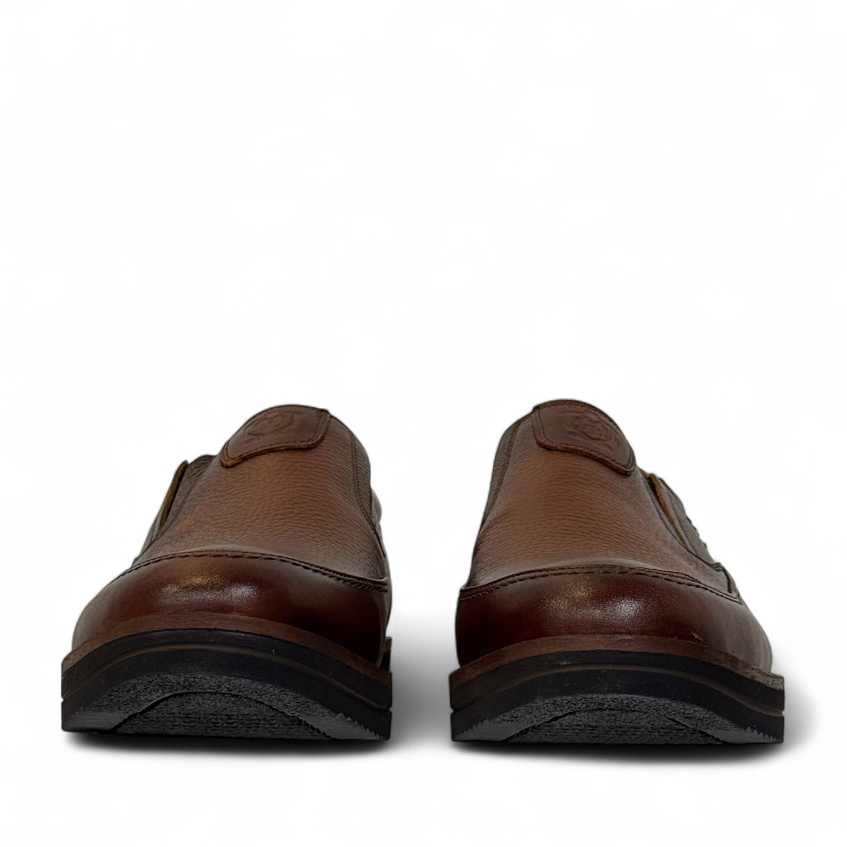 Satel Niavaran brown leather slip-on shoes with handmade stitching and a durable rubber outsole for formal wear. Photo of front view.