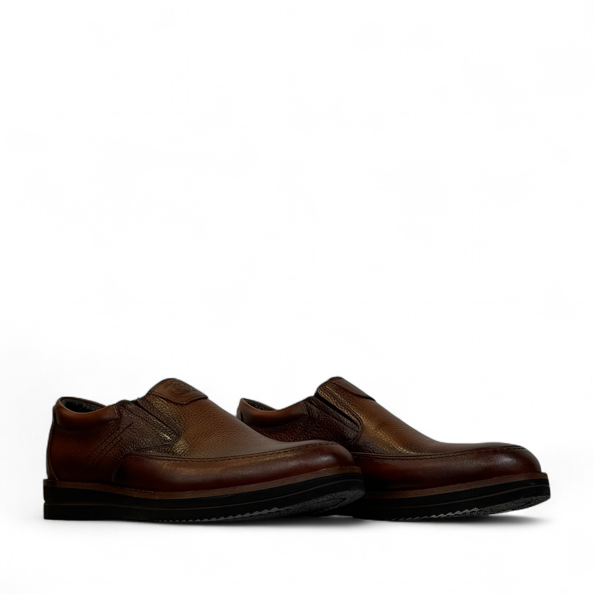 Satel Niavaran brown leather slip-on shoes with handmade stitching and a durable rubber outsole for formal wear. Photo of side views.