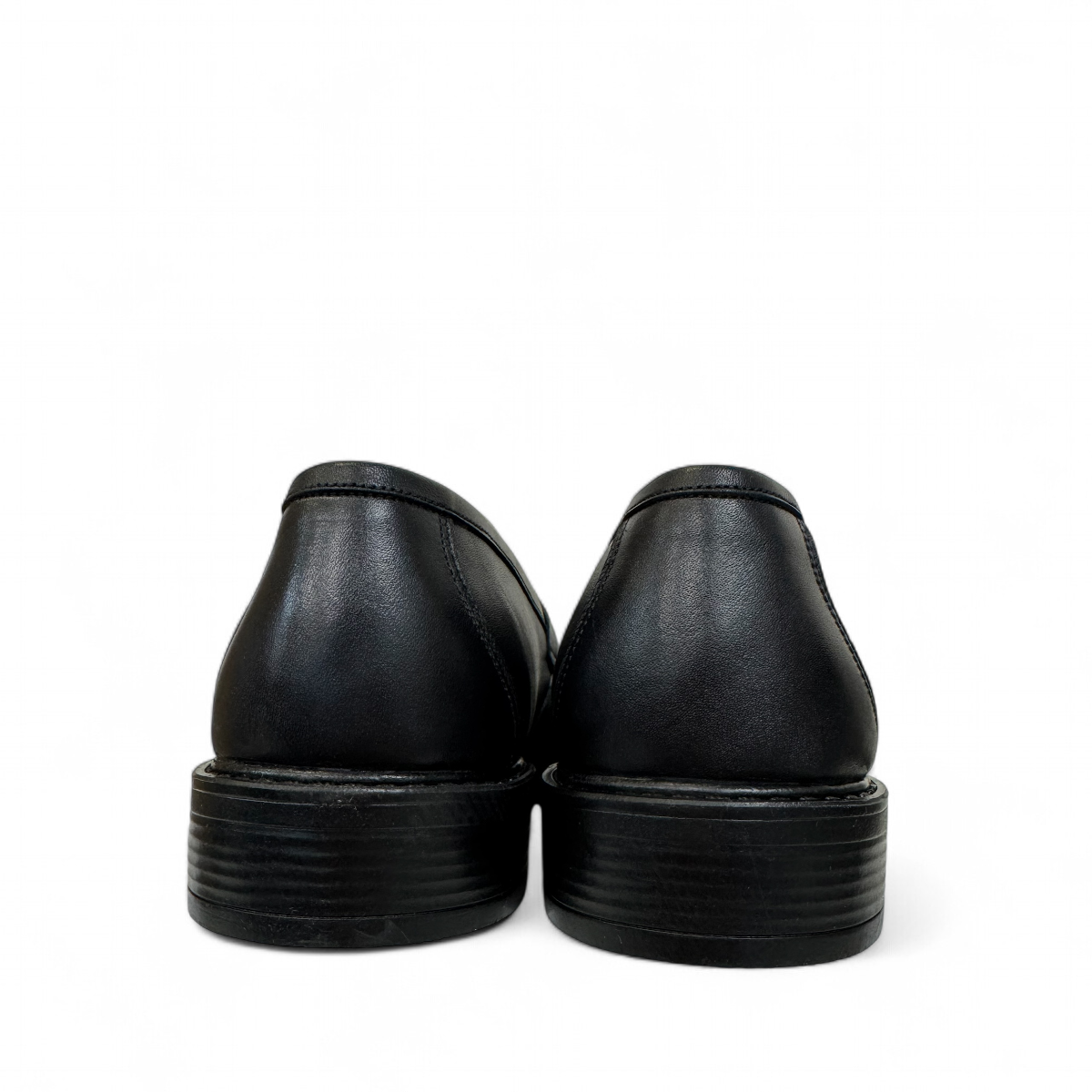 Satel Satani black leather loafer with handmade stitching and durable rubber outsole for formal or casual wear. Photo of back view.