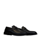 Satel Satani black leather loafer with handmade stitching and durable rubber outsole for formal or casual wear. Photo of side views.