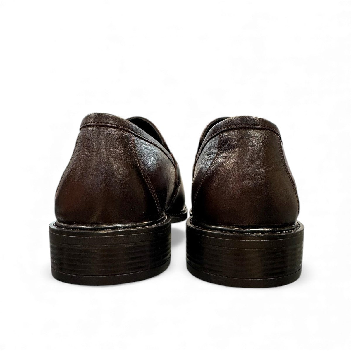 Satel Satani dark brown genuine leather loafers with handmade stitching and a durable rubber outsole. Photo of back view.