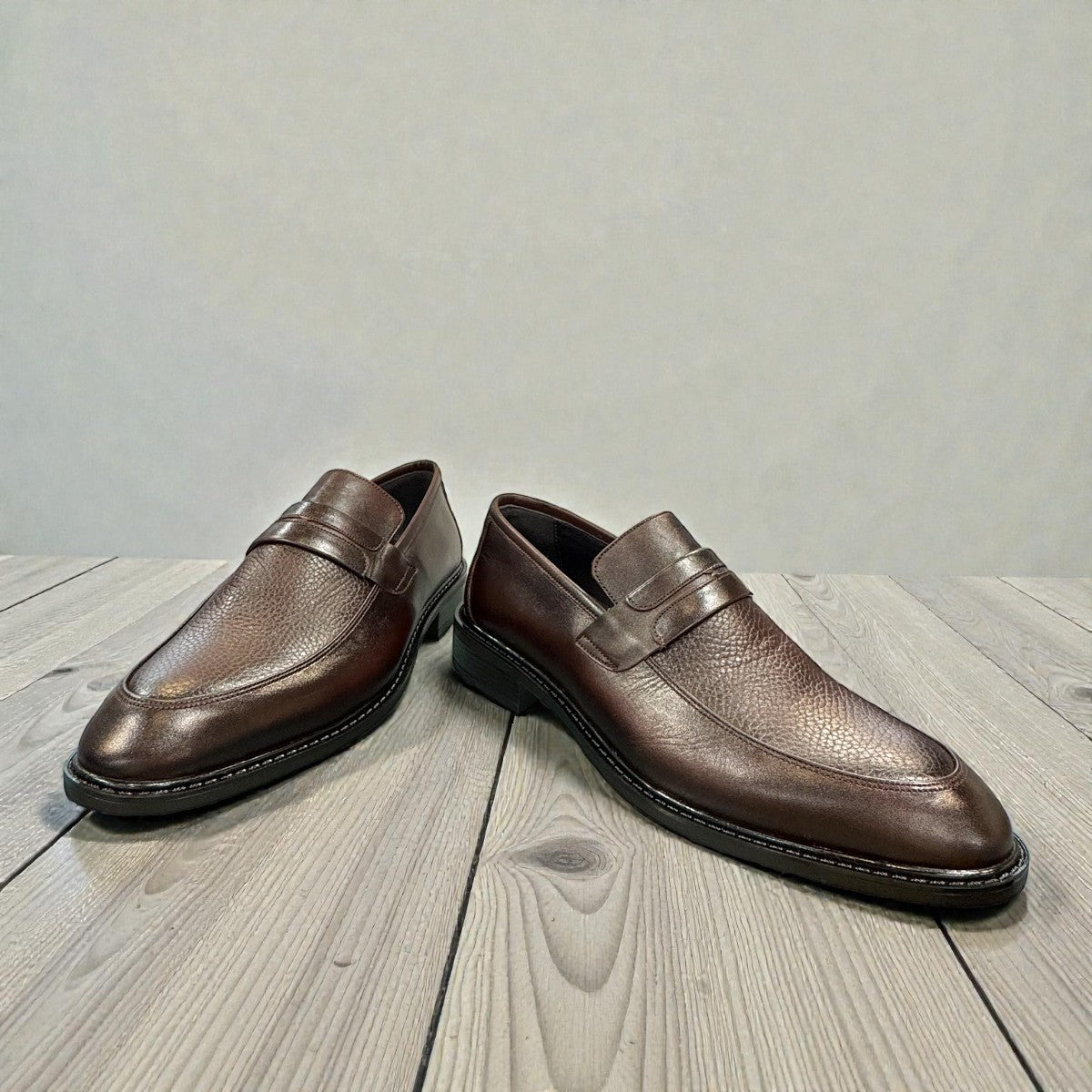Satel Satani dark brown genuine leather loafers with handmade stitching and a durable rubber outsole. Photo of front view.