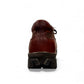 Satel Shorabil brown leather lace-up boots with durable rubber lug soles and detailed handmade stitching. Photo of back view.