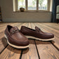 Satel Velnayak brown leather loafer with metal bit detail, handmade stitching, and a durable beige rubber outsole. Photo of front view.