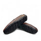 Satel Yashar dark brown leather loafers with perforated detail and handmade stitching. Photo of bottom view.