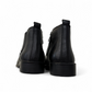 Satel Yazd black leather boots with elastic side panels, handmade stitching, and durable rubber outsole. Photo of back view.