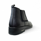 Satel Yazd black leather boots with elastic side panels, handmade stitching, and durable rubber outsole. Photo of back side view.