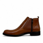 Satel Yazd light brown leather Chelsea boots with subtle handmade stitching and a durable black rubber outsole. Photo of left side view.