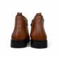 Satel Yazd light brown leather Chelsea boots with subtle handmade stitching and a durable black rubber outsole. Photo of back view.