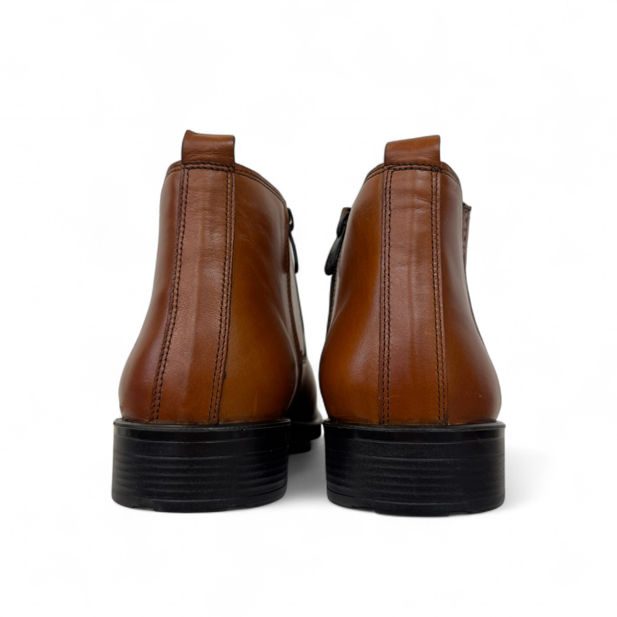 Satel Yazd light brown leather Chelsea boots with subtle handmade stitching and a durable black rubber outsole. Photo of back view.