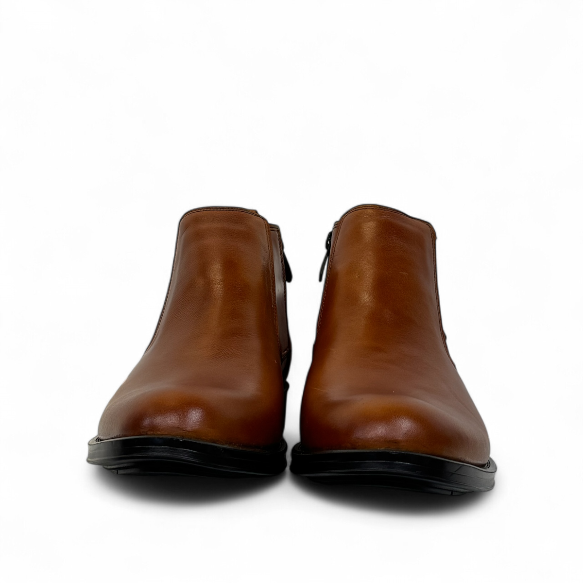 Satel Yazd light brown leather Chelsea boots with subtle handmade stitching and a durable black rubber outsole. Photo of front view.