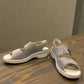 Softline Hedi sandals in umbra leather with a shiny textured finish, wedge heel, and adjustable straps.
photo of the front side