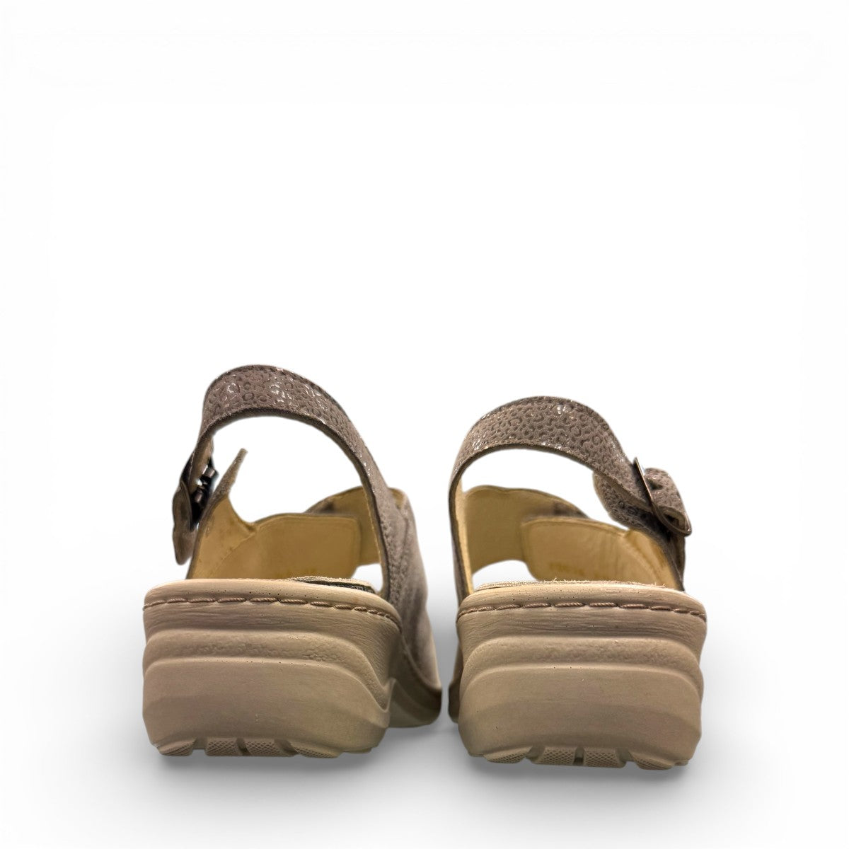 Softline Hedi sandals in umbra leather with a shiny textured finish, wedge heel, and adjustable straps.
photo of the back side
