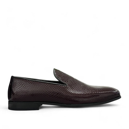 Sun Adriyan maroon patent leather loafers with a textured finish and durable rubber outsole. Photo of outside side view.