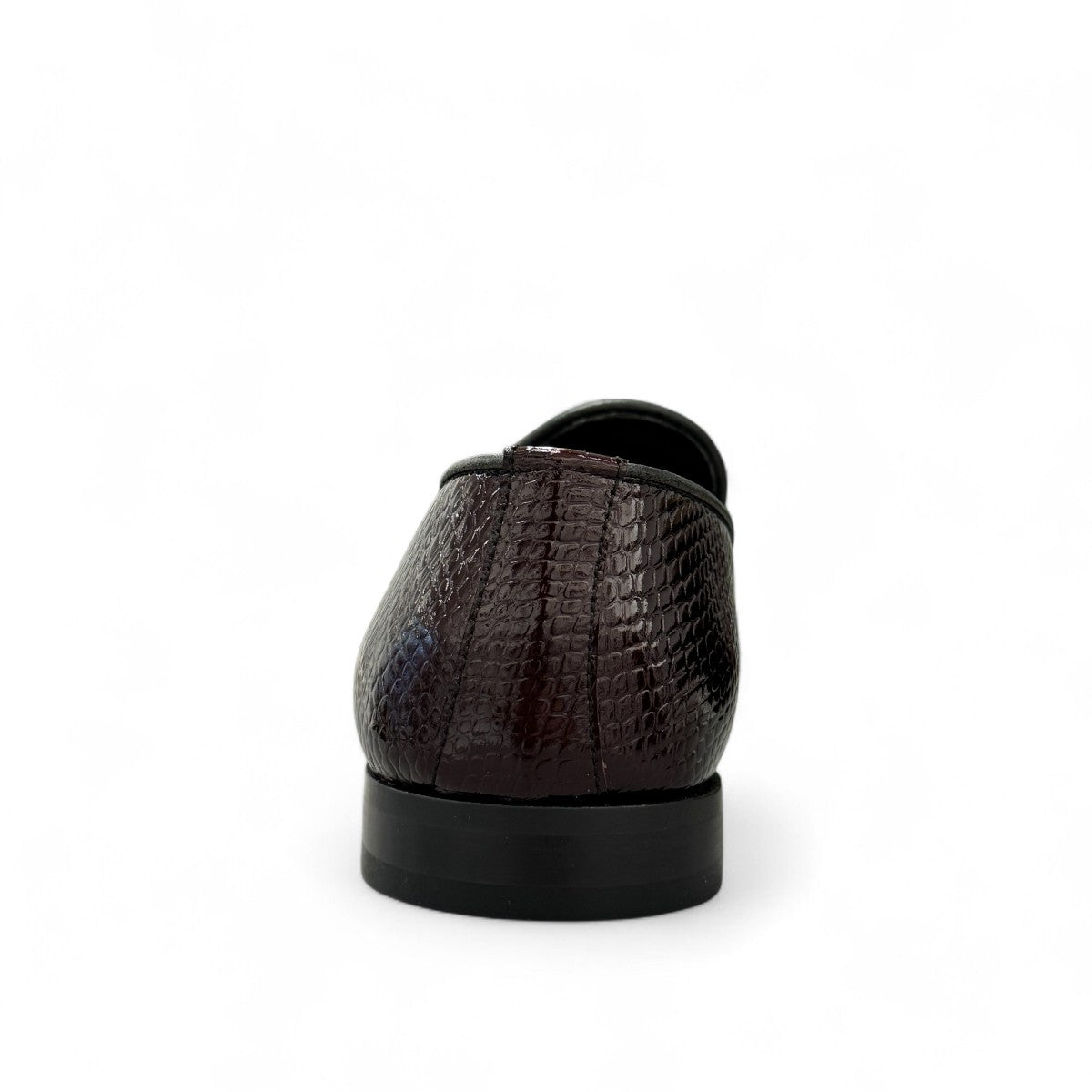 Sun Adriyan maroon patent leather loafers with a textured finish and durable rubber outsole. Photo of back view.