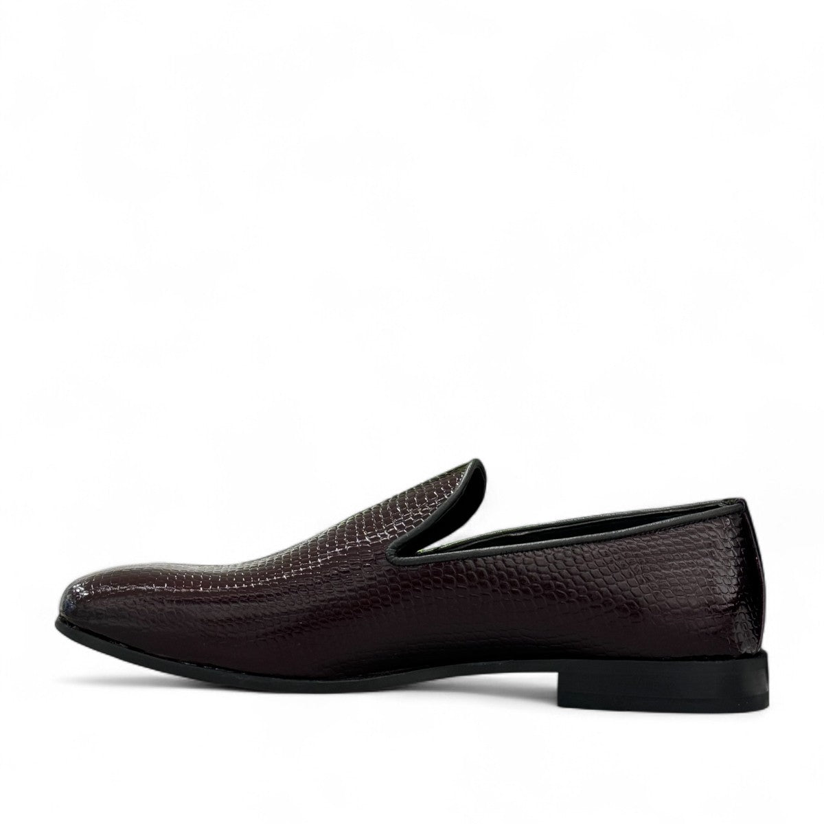 Sun Adriyan maroon patent leather loafers with a textured finish and durable rubber outsole. Photo of inside side view.