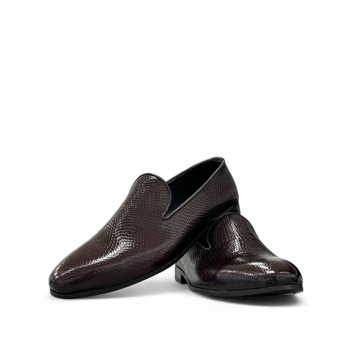 Sun Adriyan maroon patent leather loafers with a textured finish and durable rubber outsole. Photo of front view.