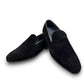 Sun Arash black suede slip-on loafers with subtle handmade stitching and a durable rubber outsole. Photo of front view 1.