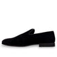Sun Arash black suede slip-on loafers with subtle handmade stitching and a durable rubber outsole. Photo of inside side view.